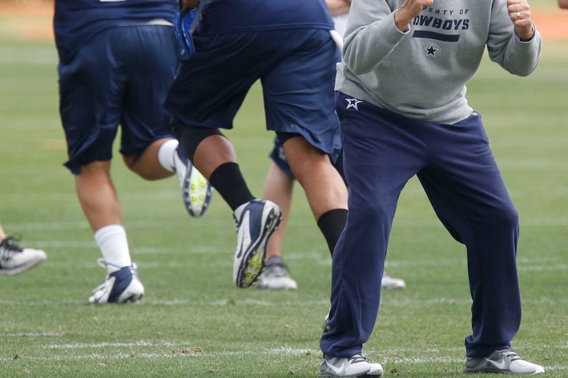 Defensive coordinator Monte Kiffin directs the defense during Dallas Cowboys rookie minicamp...