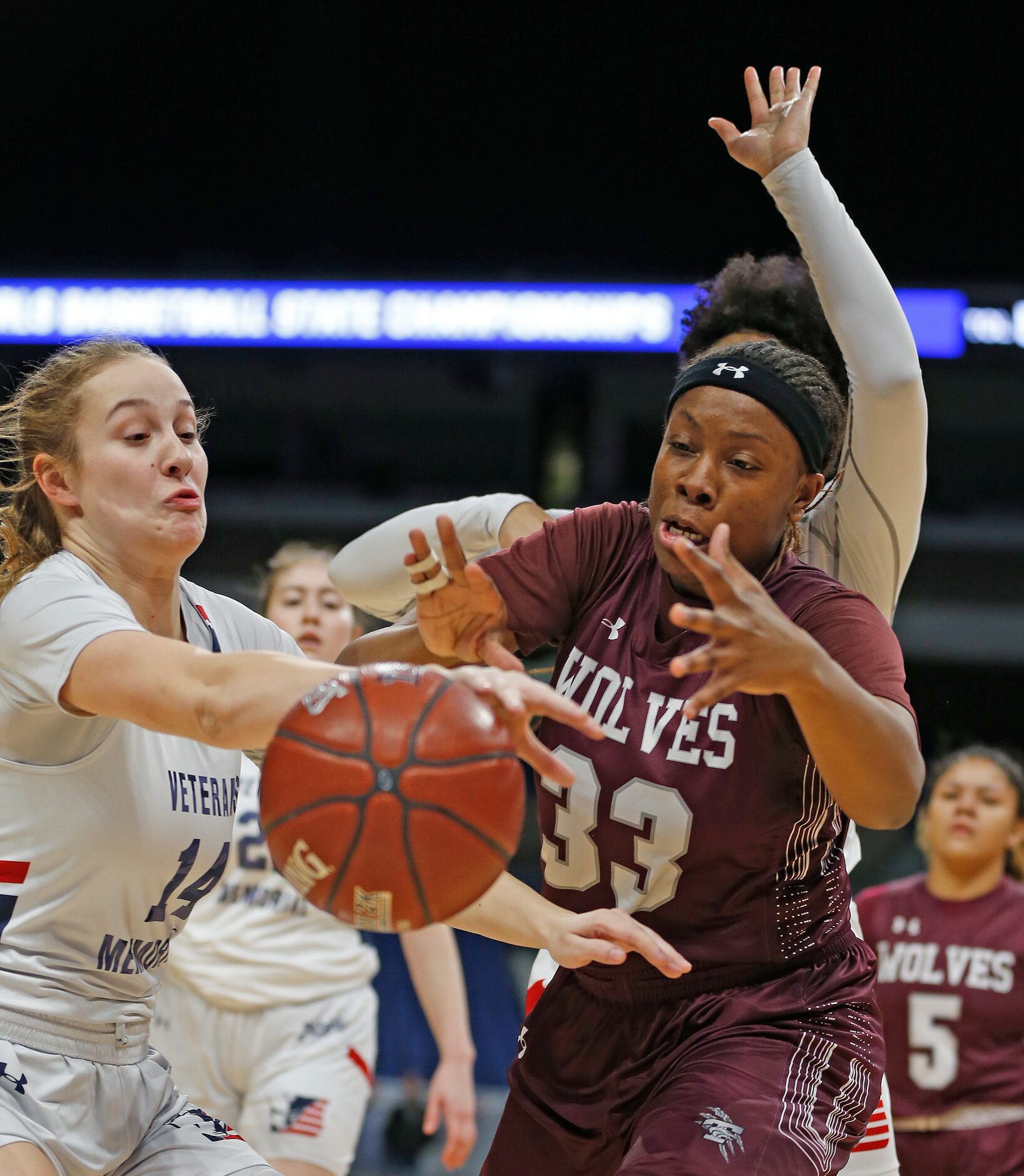 Mansfield Timberview Forward Destiny Burton #33 battles Veterans Memorial guard Breanna...