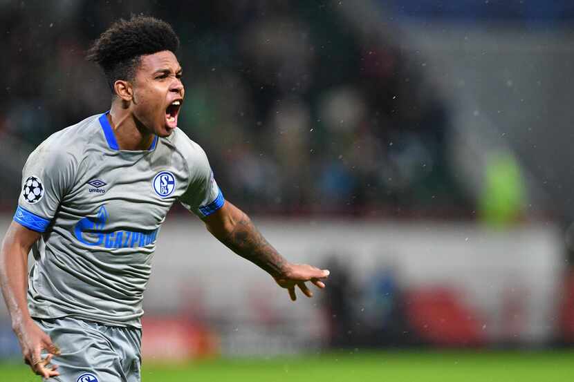 Schalke's US midfielder Weston McKennie celebrates after scoring a goal during the UEFA...