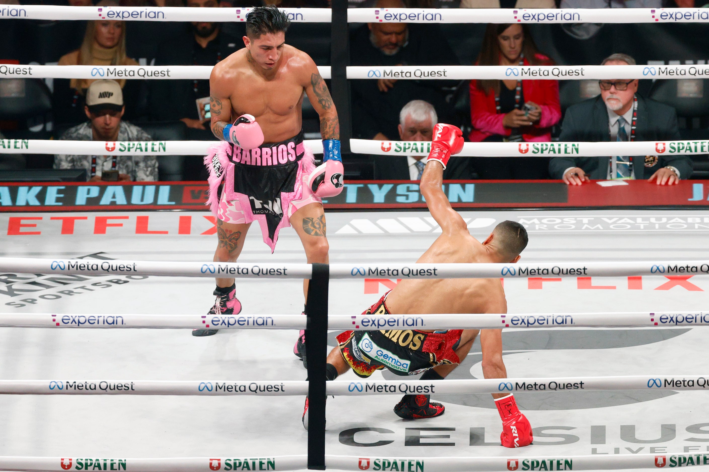 Mario Barrios drops Abel Ramos with a punch during round two of a boxing match for the WBC...