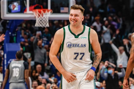 Dallas Mavericks guard Luka Doncic (77) celebrates a 3 points shot against the Brooklyn Nets...