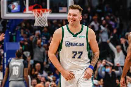 Dallas Mavericks guard Luka Doncic (77) celebrates a 3 points shot against the Brooklyn Nets...