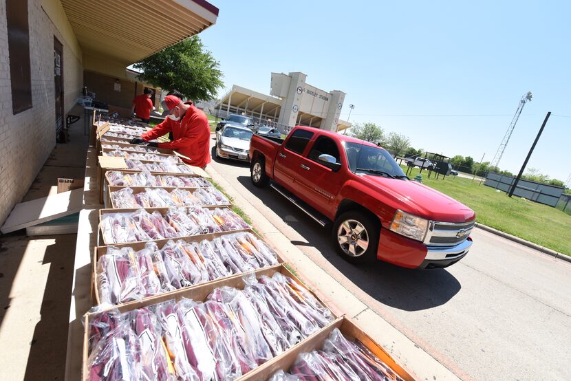 Graduating seniors at Killeen High School picked up their caps and gowns from Herff Jones at...