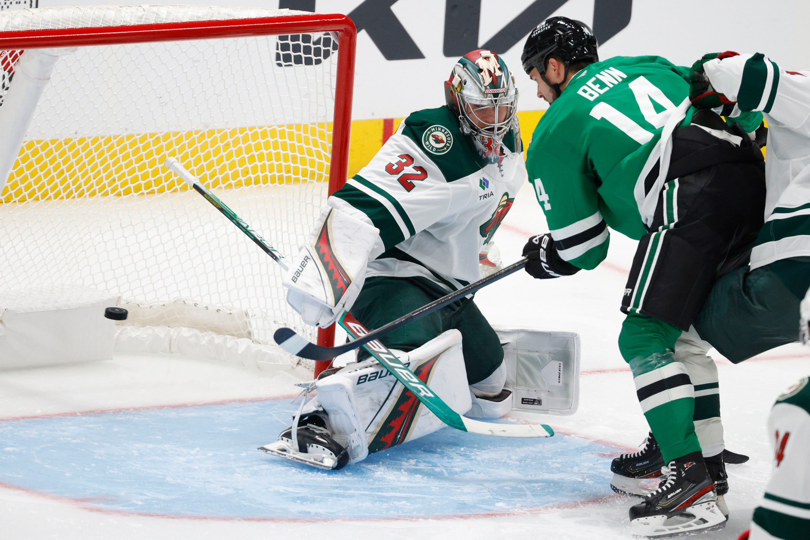 Dallas Stars left wing Jamie Benn (14) scores a goal against Minnesota Wild goaltender Filip...