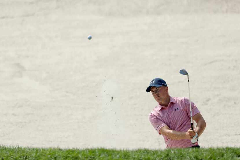 FARMINGDALE, NY - AUGUST 26: Jordan Spieth of the United States plays his second shot on teh...