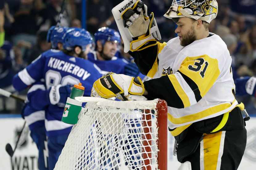 Pittsburgh Penguins goalie Antti Niemi (31), of Finland, reacts after Tampa Bay Lightning...