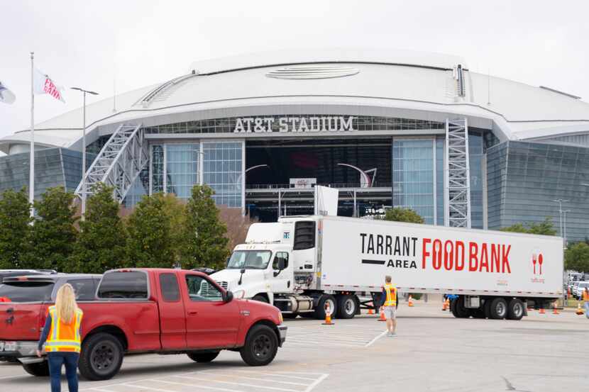 A Tarrant Area Food Bank truck parked in front of AT&T Stadium as part of of the TAFB's Mega...