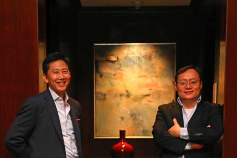 Joe Chen (right), CEO and founder of Renren, got a helping hand from  attorney Wilson Chu.