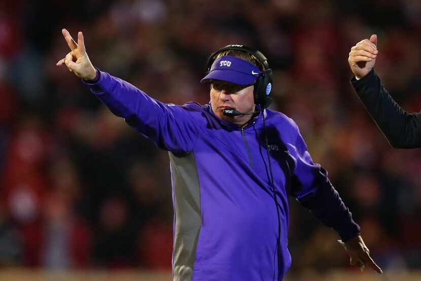 NORMAN, OK - NOVEMBER 21:  Head coach Gary Patterson of the TCU Horned Frogs signals for a...