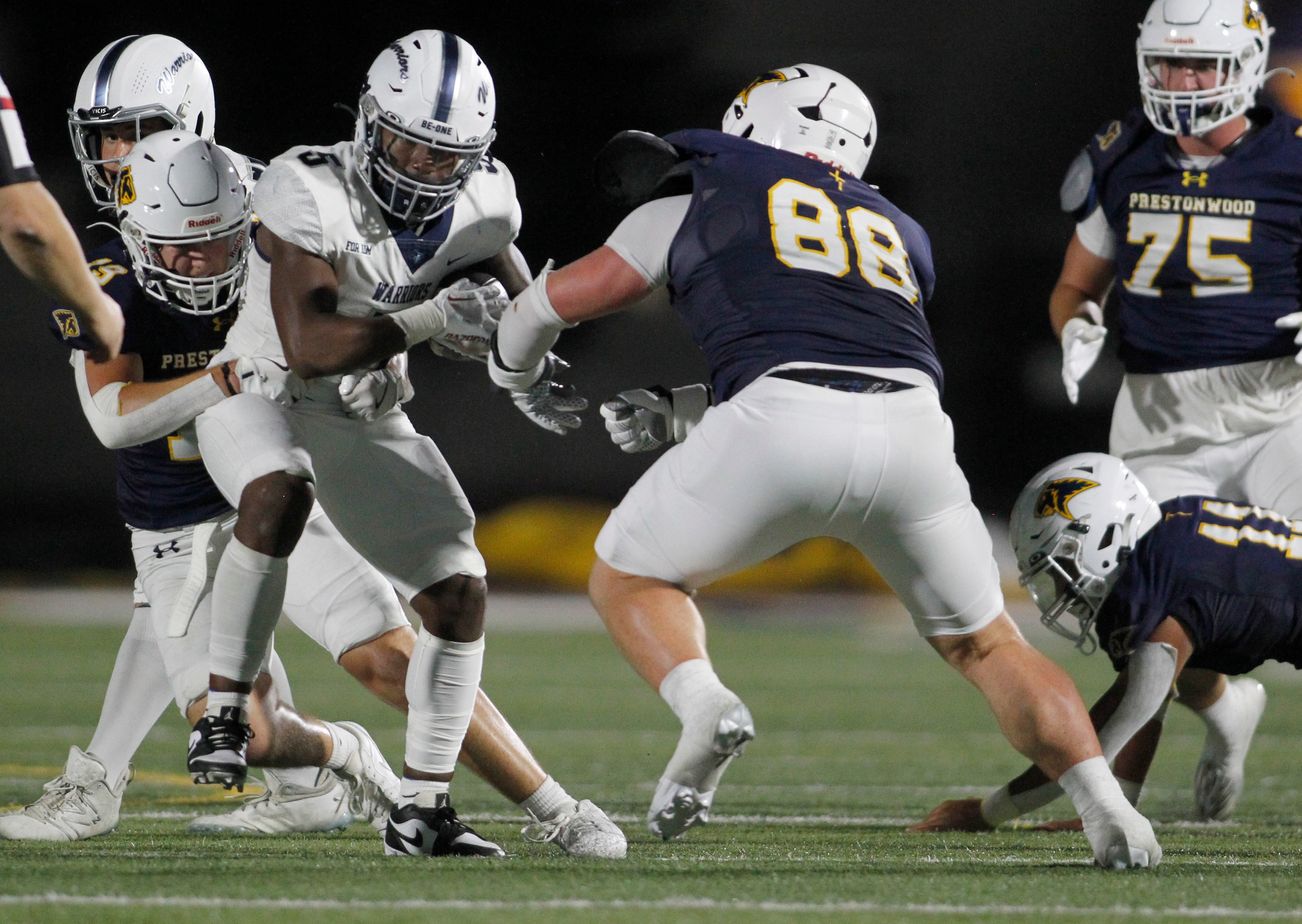 Argyle Liberty Christian running back Chase Garnett (5). left, draws a lot of attention from...