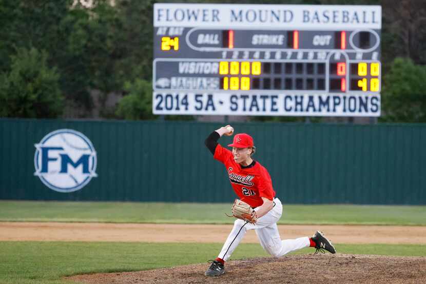 Coppell High’s Andrew Schultz throws a pitch during the fourth inning of a high school...