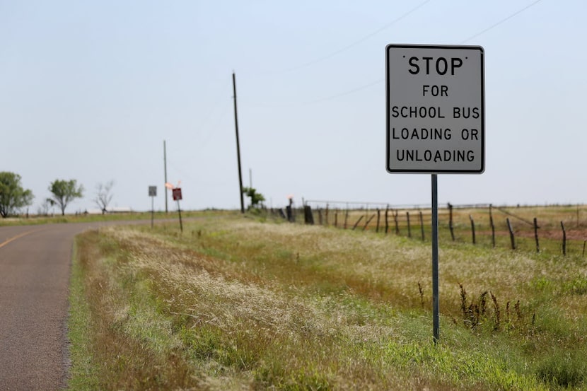 A school bus sign near the lone school in Harrold ISD in Harrold, Texas.