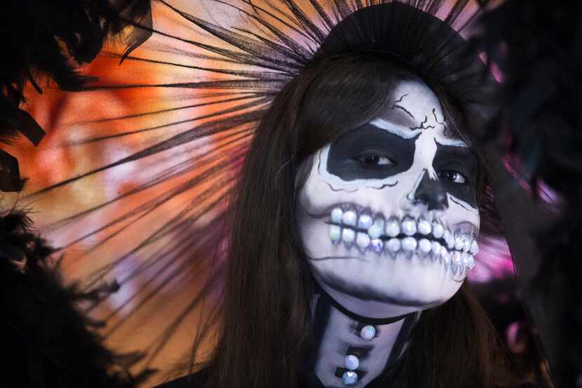 Model Brittney Martinez is styled as a traditional Catrina in a 1840's dress at a Día de los...