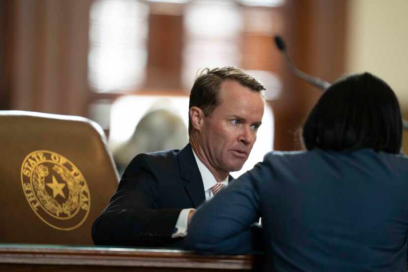 House Speaker Dade Phelan, R-Beaumont, talks with Jessica Gonzales, D-Dallas, during the...