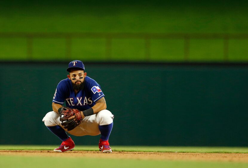 Texas Rangers second baseman Rougned Odor (12) looks toward the dugout during the seventh...