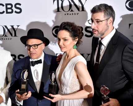 From left: Composer David Yazbek, actress Katrina Lenk and producer Orin Wolf show off their...