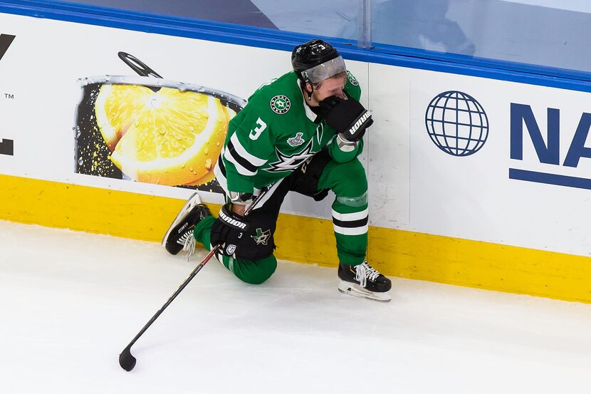 John Klingberg (3) of the Dallas Stars reacts to his team's loss against the Tampa Bay...