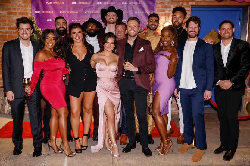 Love is Blind cast members pose for a photo on the red carpet during a watch party for the...