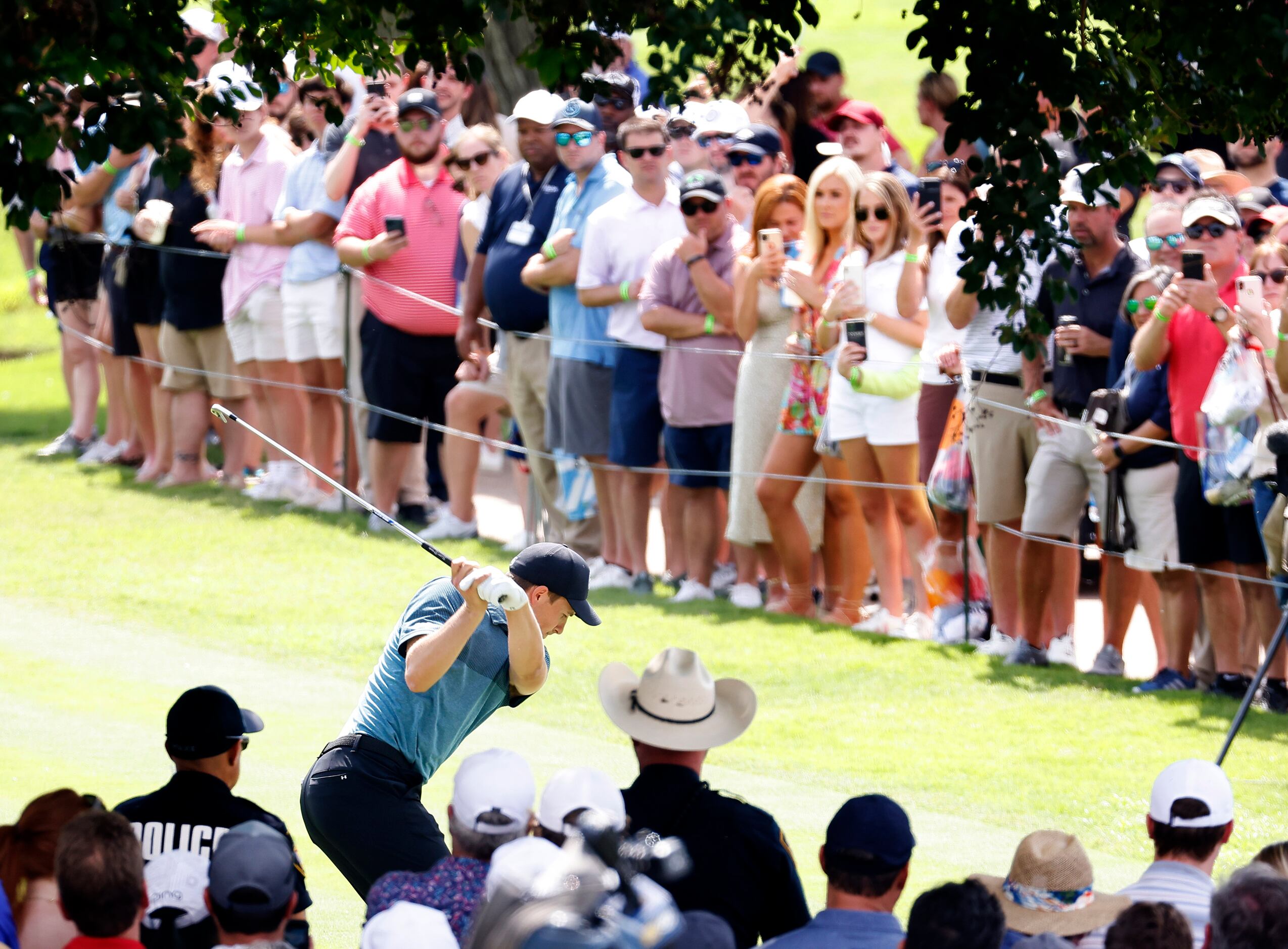 A large gallery followed professional golfer Jordan Spieth of Dallas as he teed off on No....