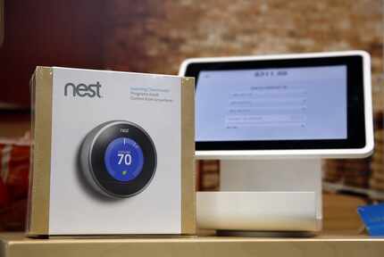 The Nest Thermostat is on display at Best Buy in Dallas, Thursday, February 20, 2014. (Tom...