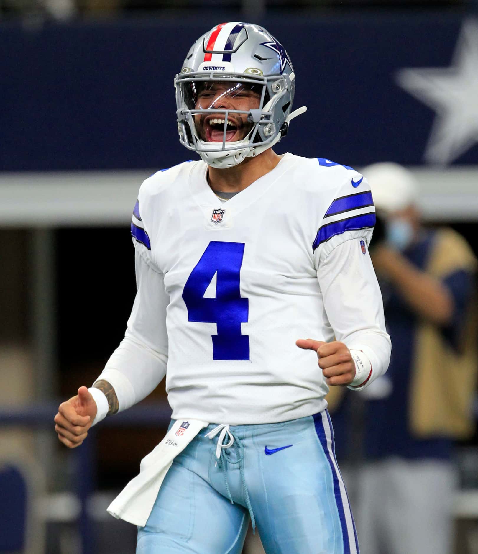Dallas Cowboys quarterback Dak Prescott (4) seems happy to return to the field, after being...