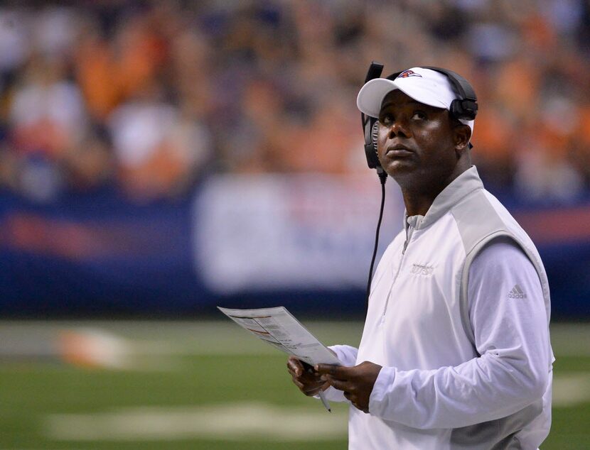 UTSA head coach Frank Wilson stands on the field during the first half of an NCAA college...