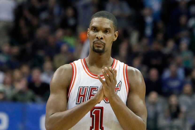 FILE - In this Feb. 3, 2016, file photo, Miami Heat forward Chris Bosh (1) reacts to a call...