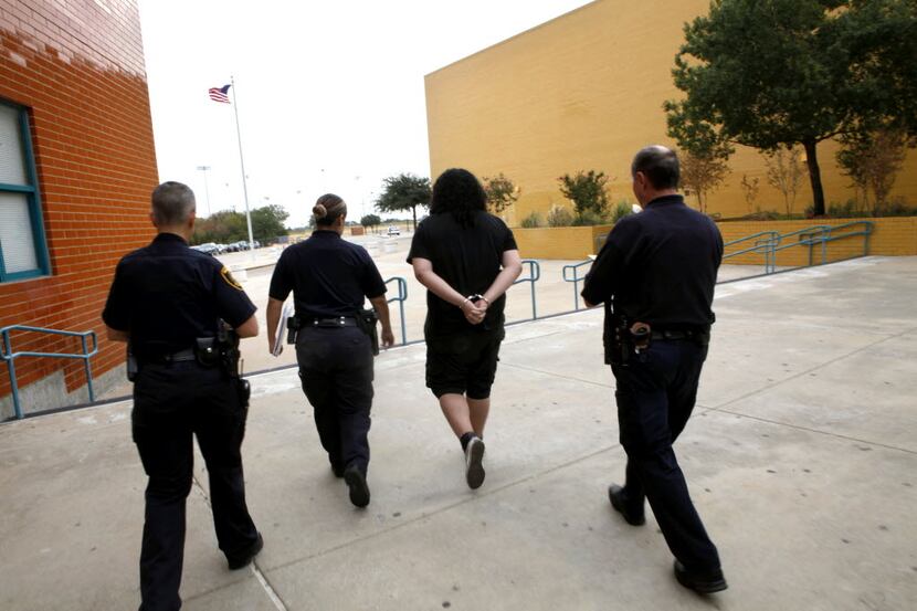 A 15-year-old student is taken from a Dallas high school to a Dallas County Truancy Court...