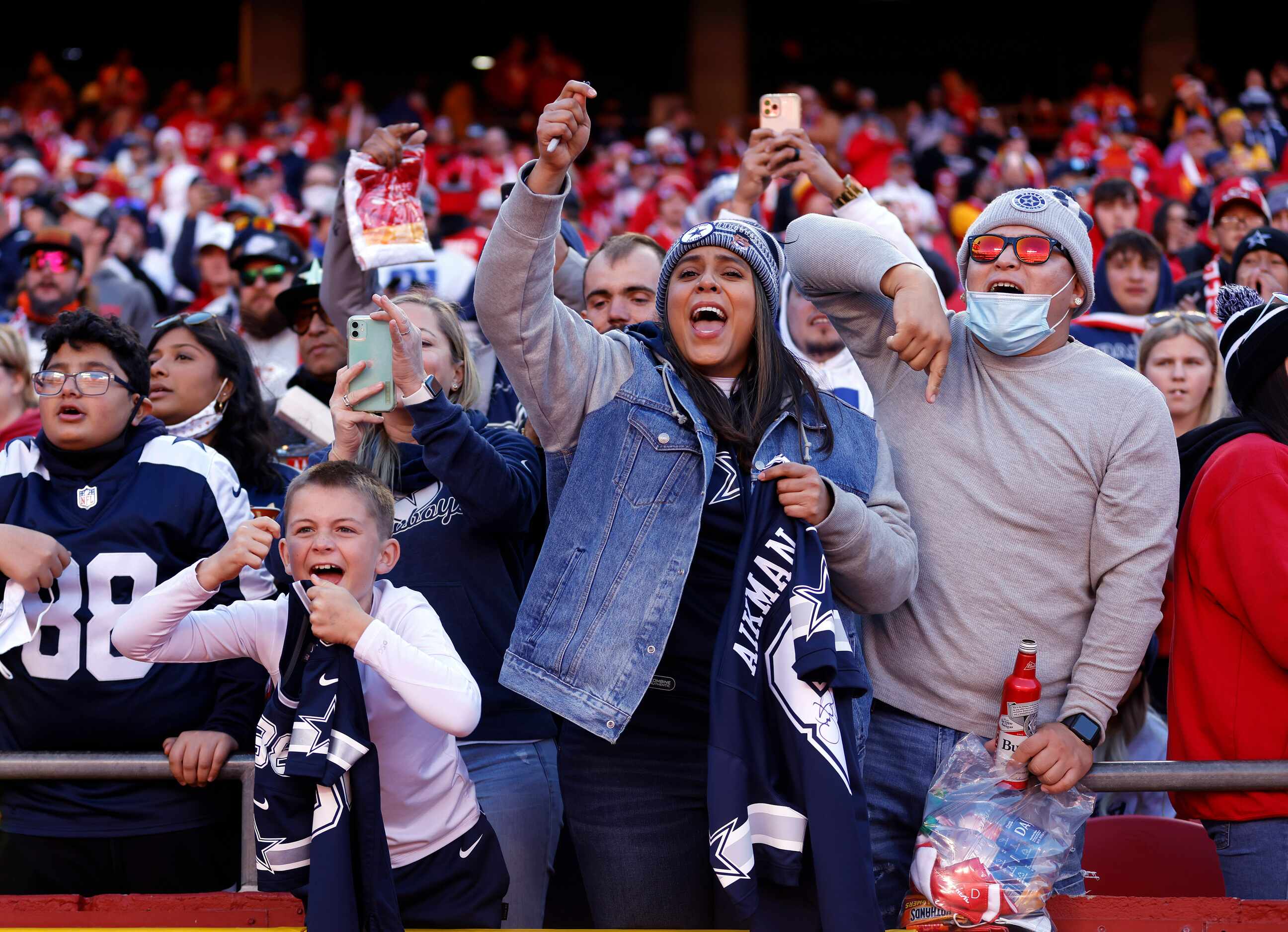 Dallas Cowboys fans cheers their team during pregame warmups at Arrowhead Stadium in Kansas...