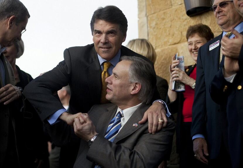 Gov. Rick Perry (left) and Attorney General Greg Abbott together in 2010.