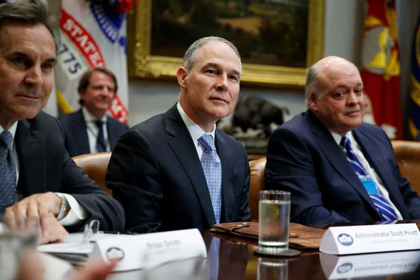 Environmental Protection Agency administrator Scott Pruitt listens during a meeting between...