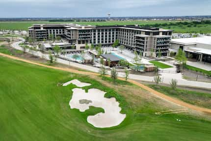 Aerial view the new Fields Ranch West golf course with the Omni PGA Frisco Resort at PGA of...