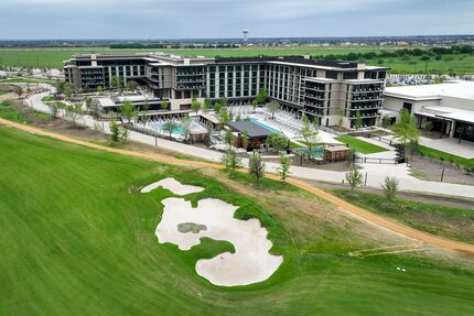 Aerial view the new Fields Ranch West golf course with the Omni PGA Frisco Resort at PGA of...