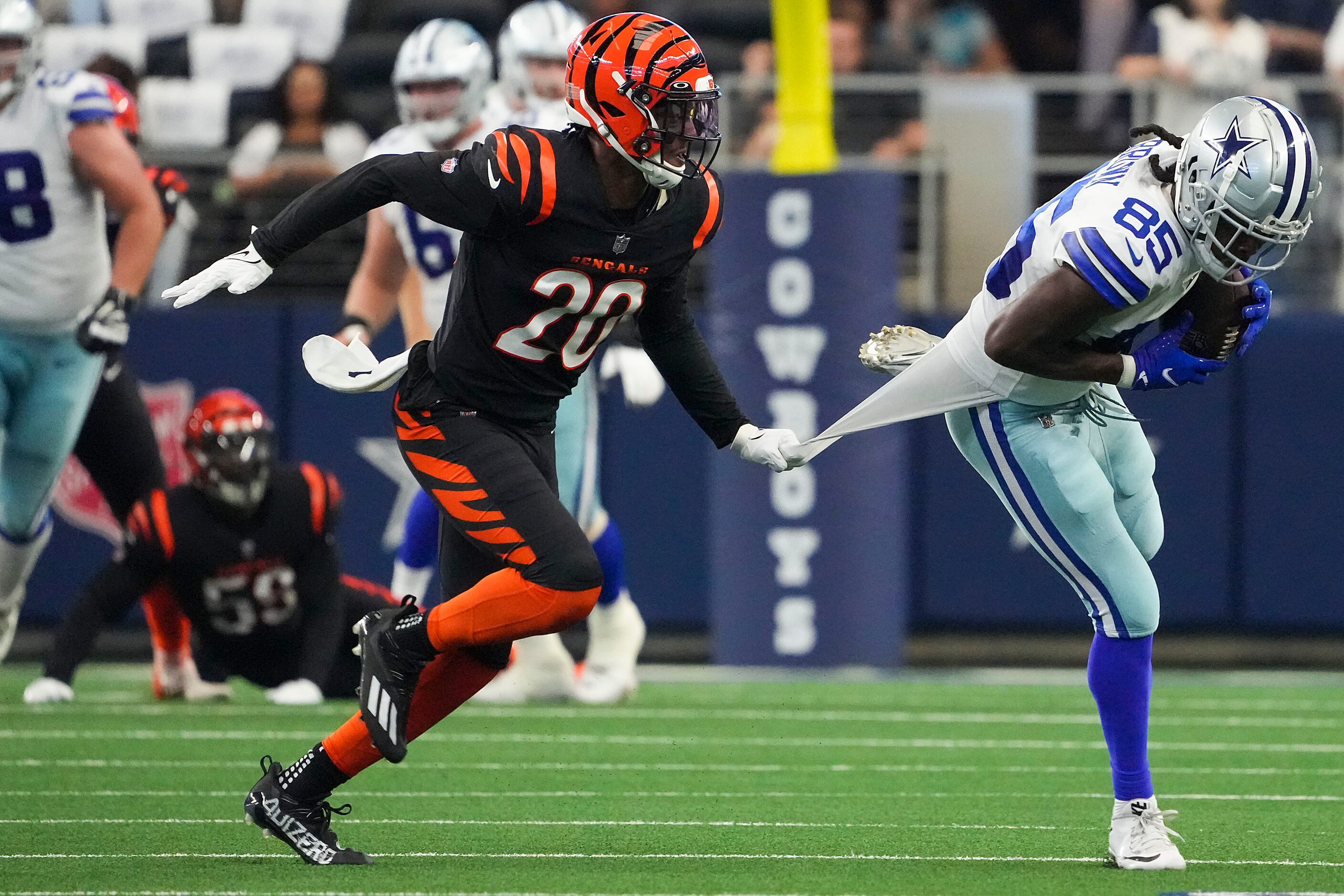 Dallas Cowboys wide receiver Noah Brown (85) hauls in a pass as Cincinnati Bengals...