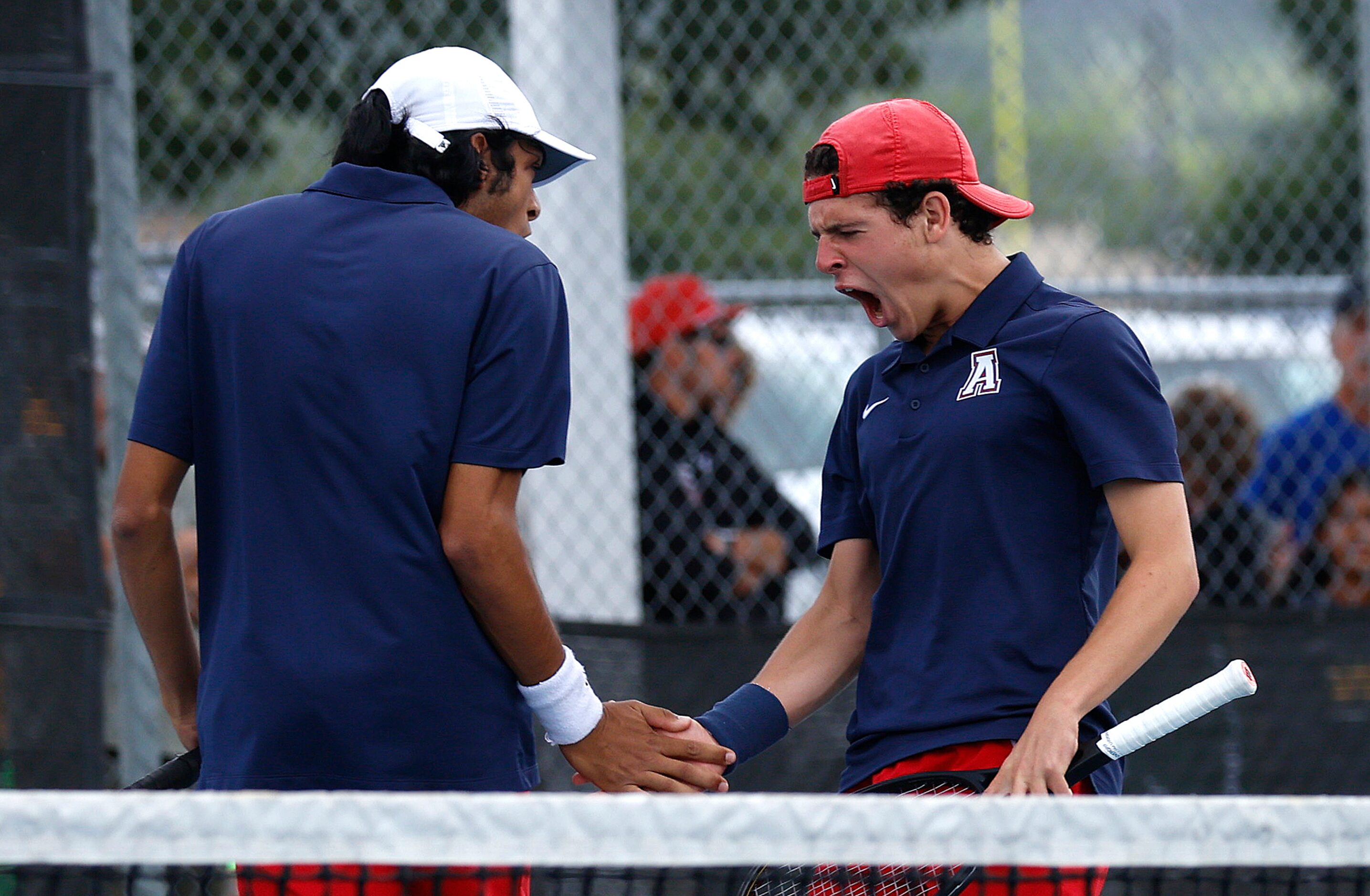 In Class 6A boys doubles Allen’s Tejas Ram celebrates with Noah Hakim prepares after a...