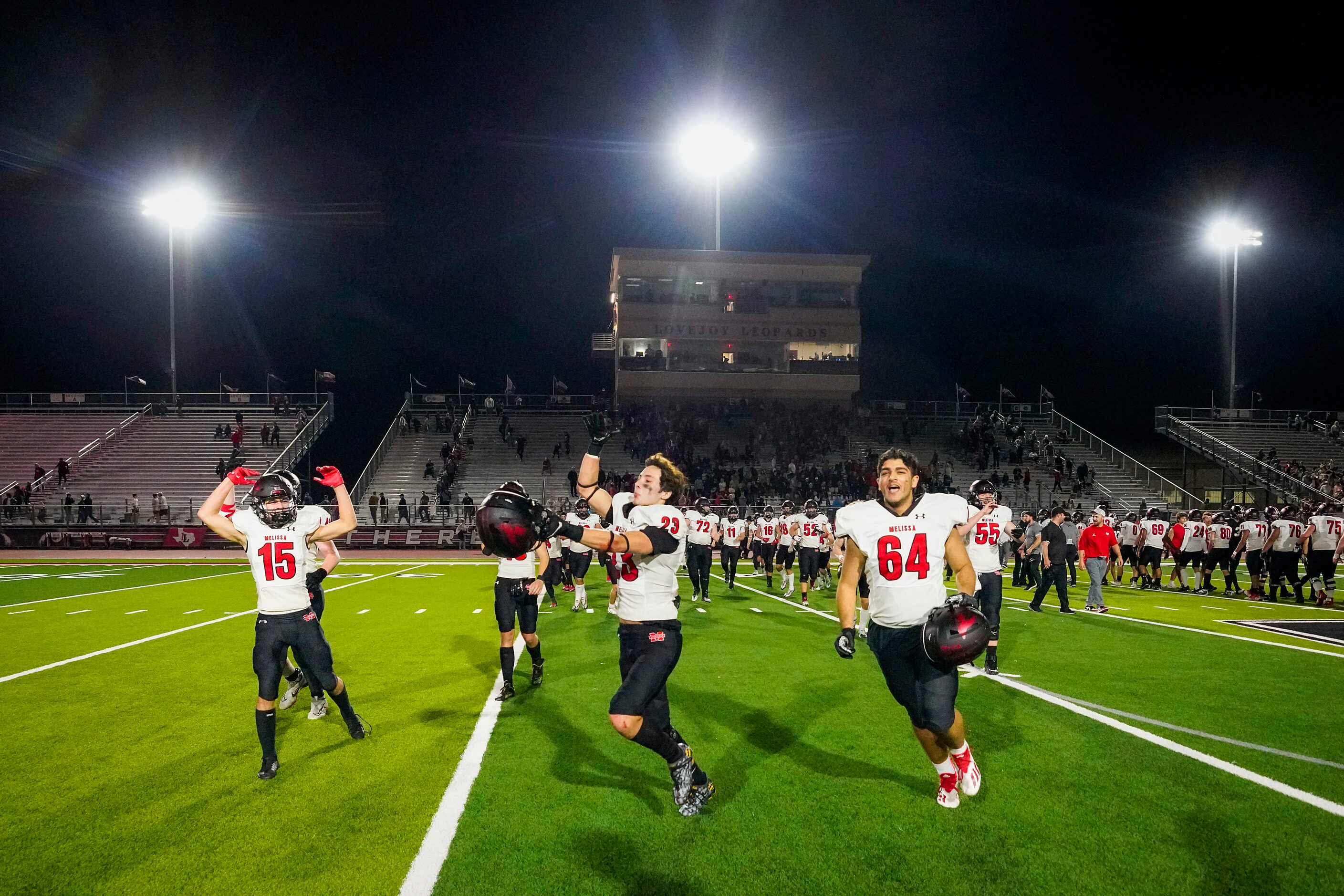 Melissa defensive back Jake Potucek (15), defensive back Josh Nicholas (23) and defensive...