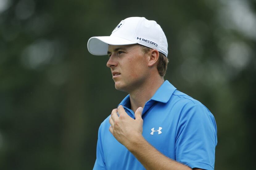 FILE - In this July 29, 2016, file photo, Jordan Spieth watches his approach shot on the...