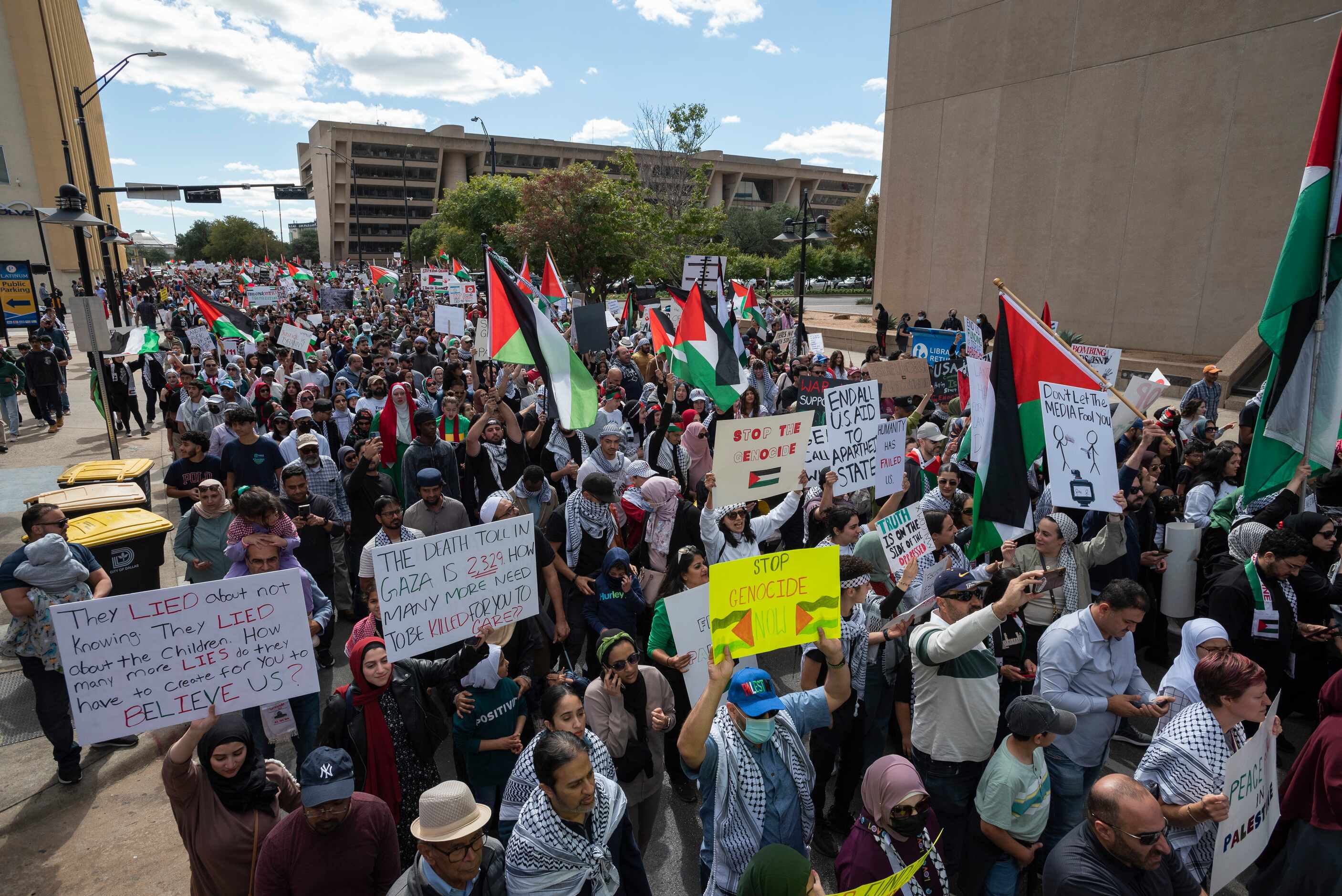 Palestine supporters march on Ervay Street during a protest titled "All Out for Palestine"...