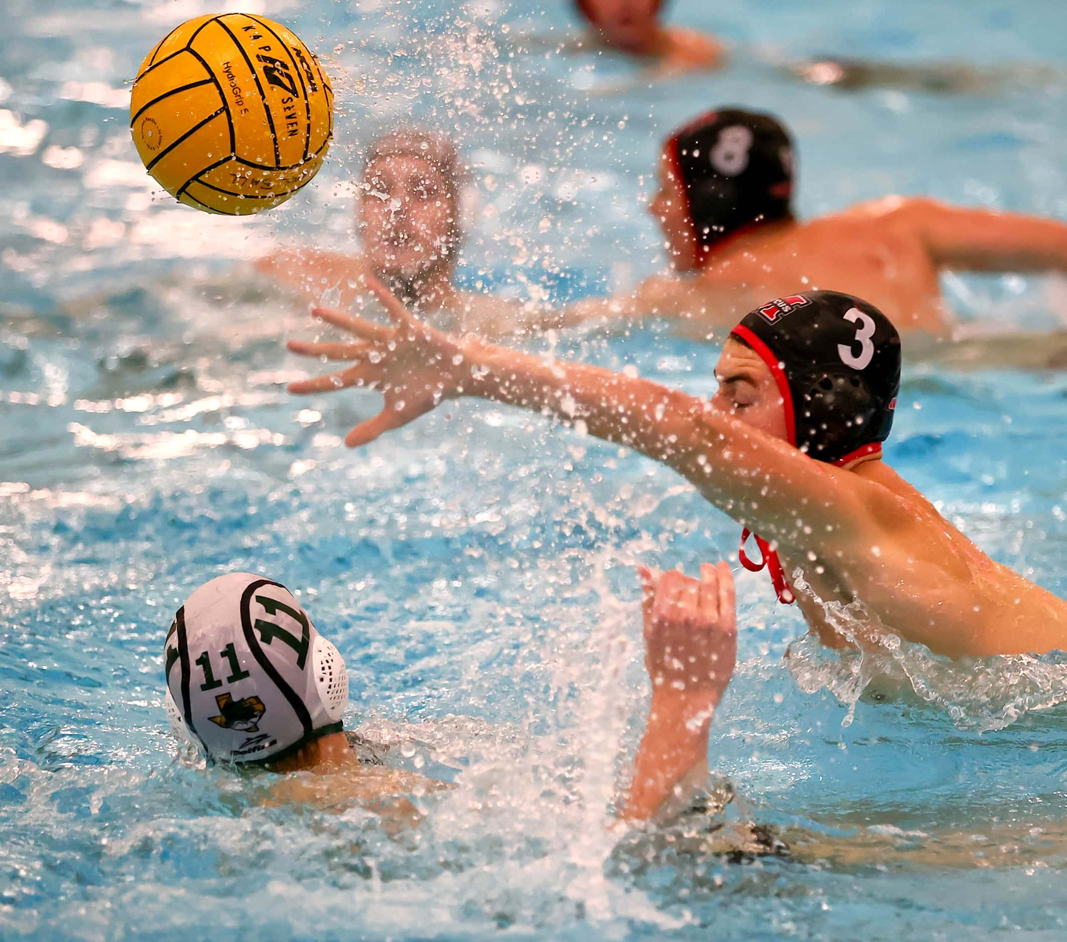 Flower Mound Marcus' Asher Brunner (3) blocks a shot from Southlake Carroll's Brandt McBride...