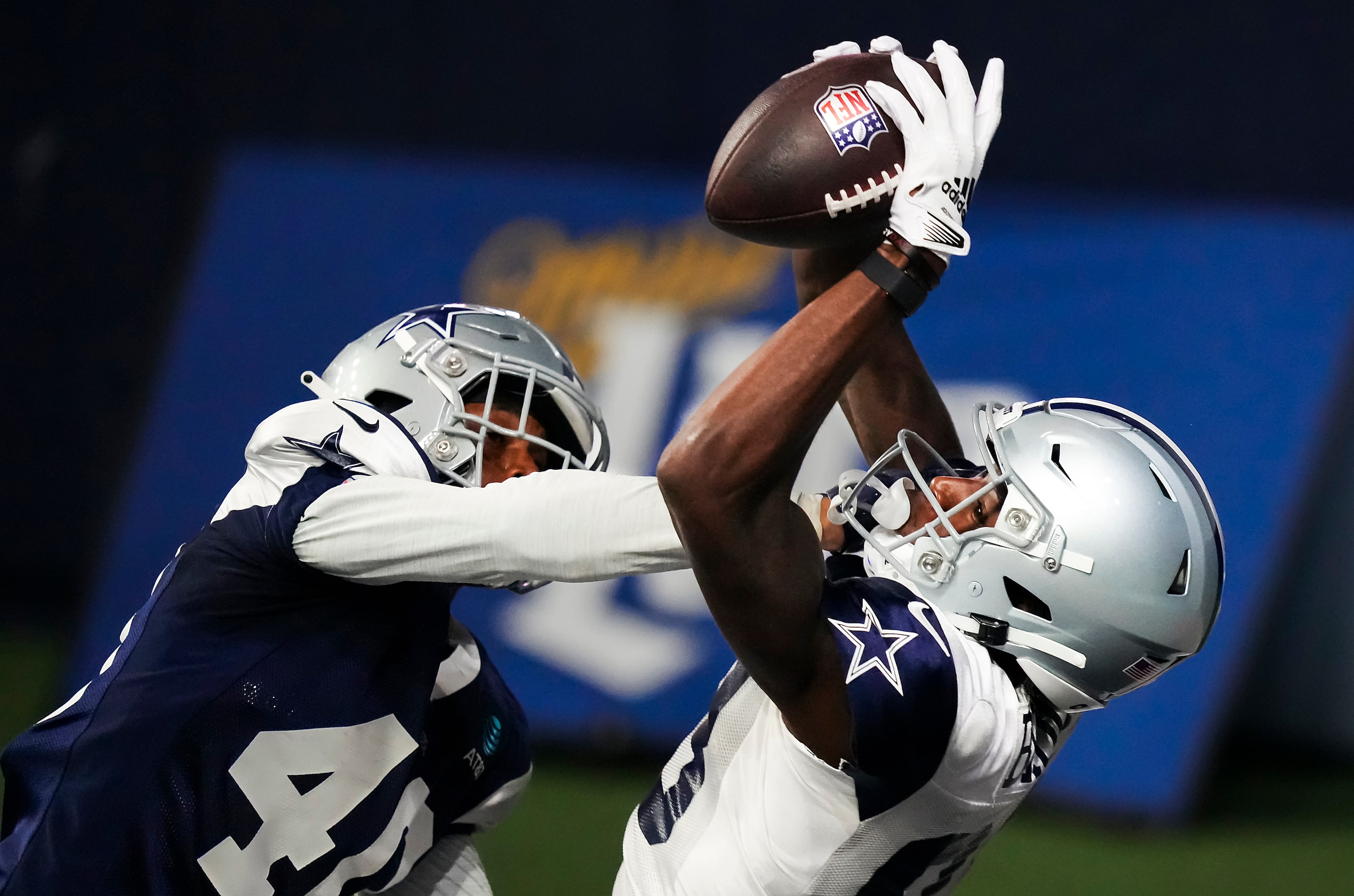 Dallas Cowboys wide receiver Jalen Brooks (83) makes a catch as cornerback Josh Butler (40)...