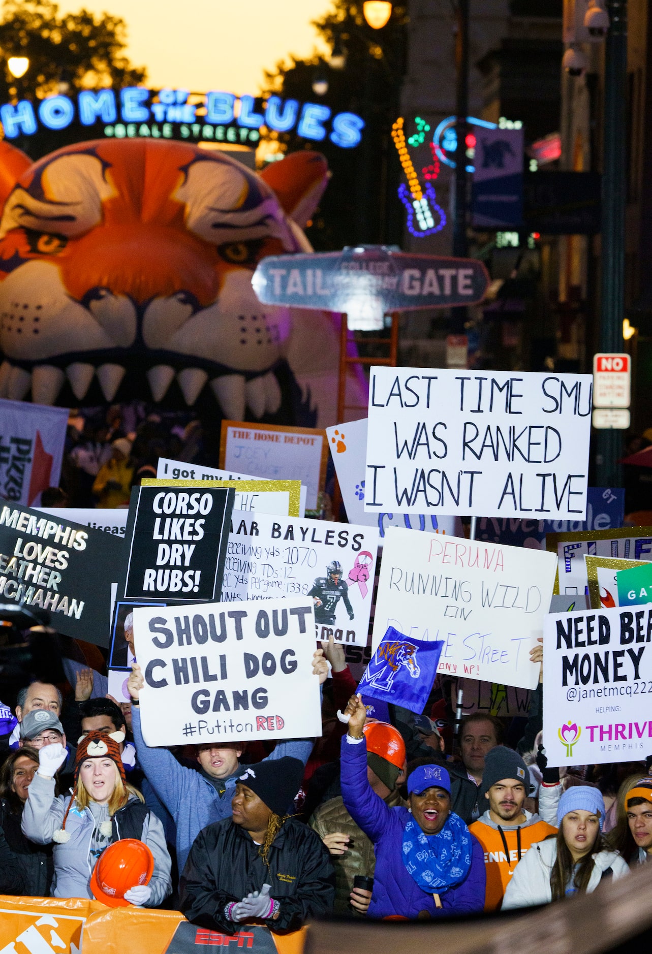 Fans fill Beale Street well before sunrise for ESPN College GameDay before an NCAA football...