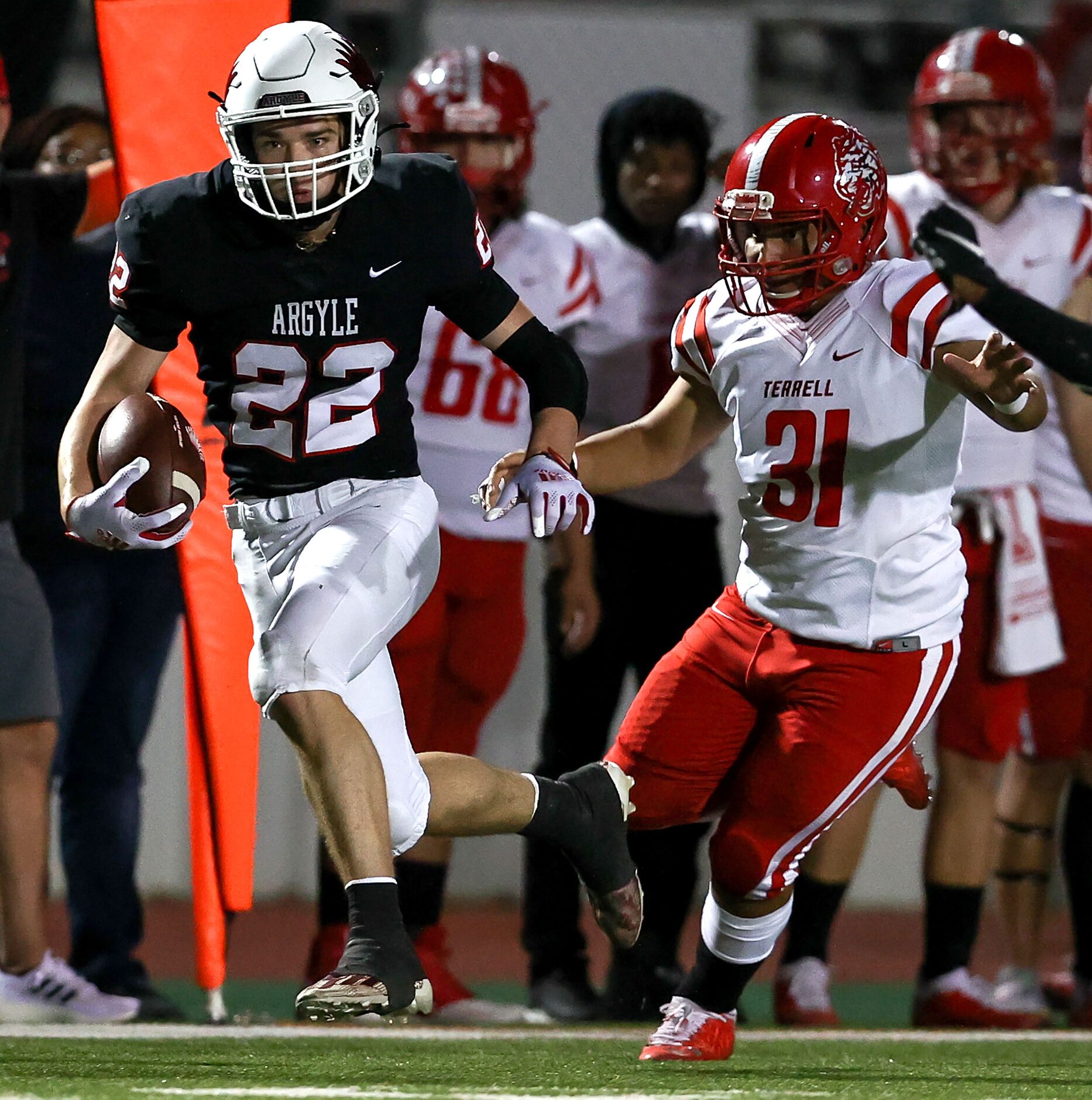 Argyle running back Dax Horany (22) looks for running room against Terrell linebacker Jared...