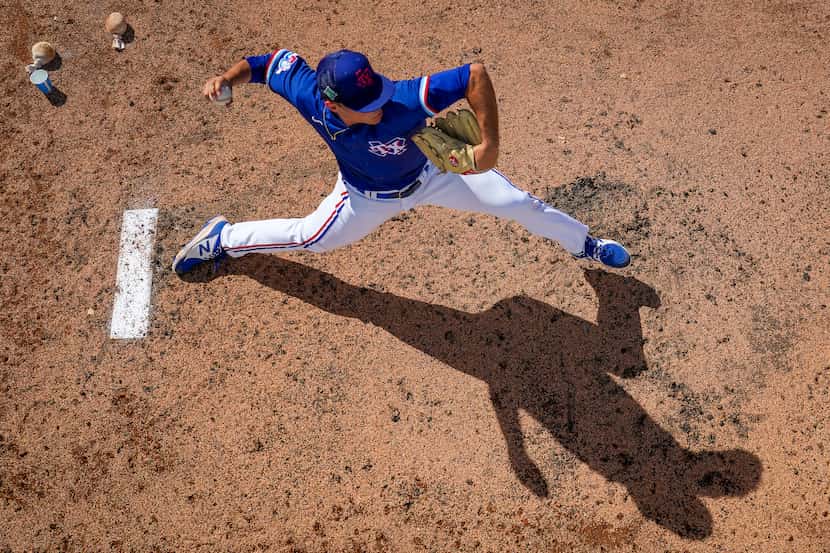 Texas Rangers pitcher Jack Leiter warms up in the bullpen during the fifth inning of a...