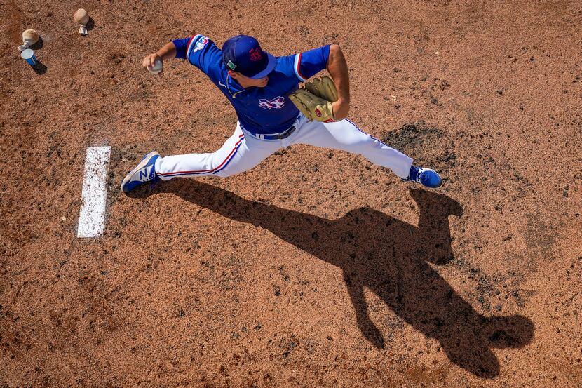 Texas Rangers pitcher Jack Leiter warms up in the bullpen during the fifth inning of a...