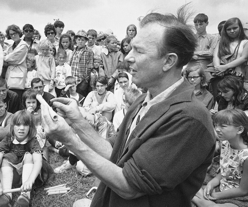 FILE - In this July 20, 1966, file photo, Pete Seeger conducts an instrument making session...