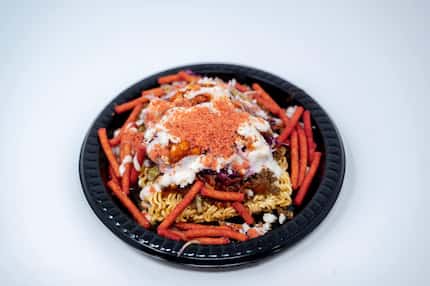 Taki Ramen Tostada can be found at Trio on the Green at the State Fair of Texas 2023. The...