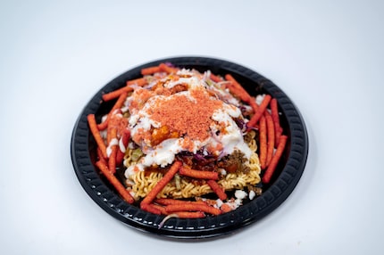 Taki Ramen Tostada can be found at Trio on the Green at the State Fair of Texas 2023. The...