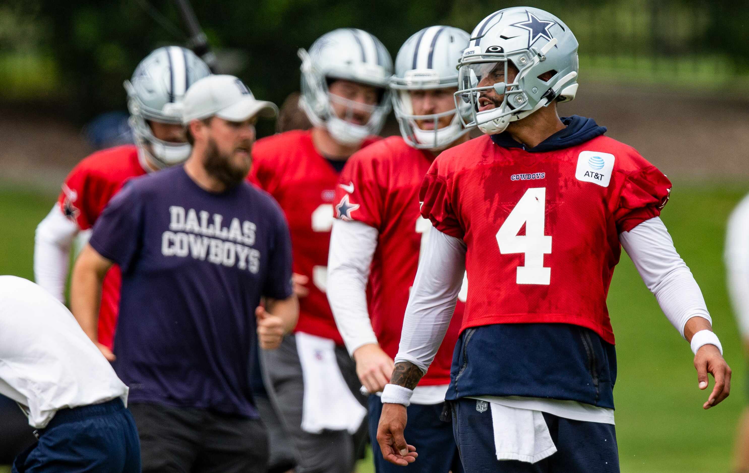 Dallas Cowboys quarterback Dak Prescott (4) looks on during practice at The Star in Frisco,...