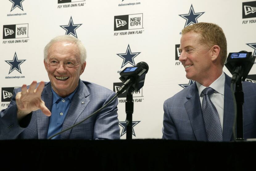 Dallas Cowboys owner Jerry Jones, left, talks about the team's NFL football draft as head...