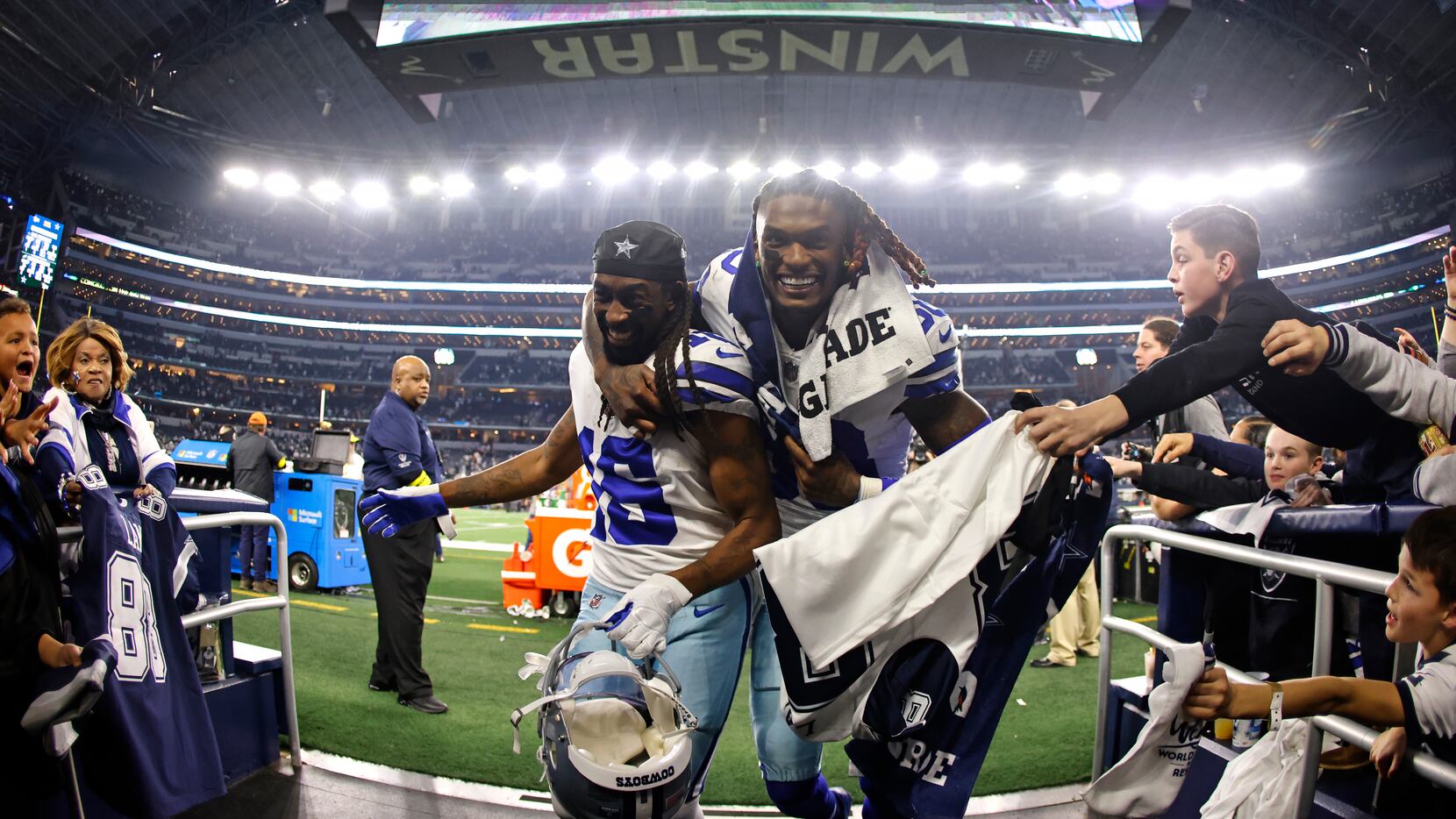 Dallas Cowboys' T.Y. Hilton and CeeDee Lamb celebrate after an NFL football game against the...